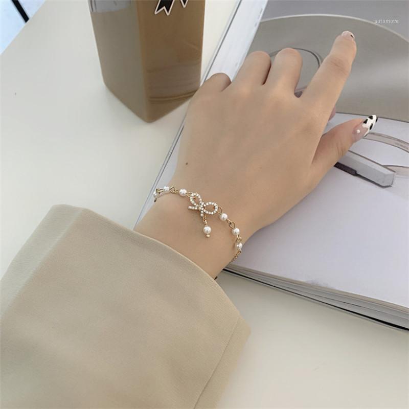 

Sweet Rhinestone Bow Star Wedding Bangle Bracelet for Women Girl Couples Classic Pearls Chain Hand Jewelry Gifts1