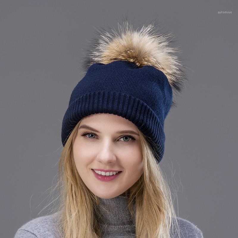 

2020 Hot The wool knitted hat spring autumn warm earmuff two types of wear woman's cap with real raccoon fur Pompom on the top1, 003