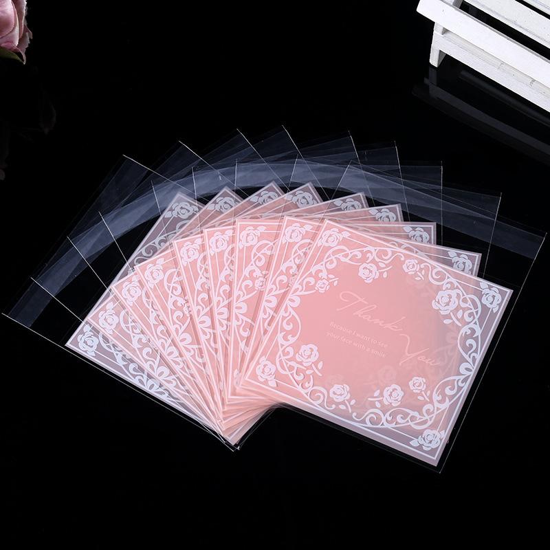 

100PCS/SET Pink Flowers Transparent Packing OPP Cookies Bag Handmade Candy Cookies Gift Bags Party DIY Present Kitchen Accessory