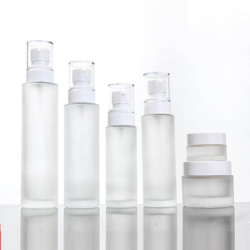 

Wholesale empty frosted pump bottle 100ml glass spray/lotion cosmetic packaging containers1