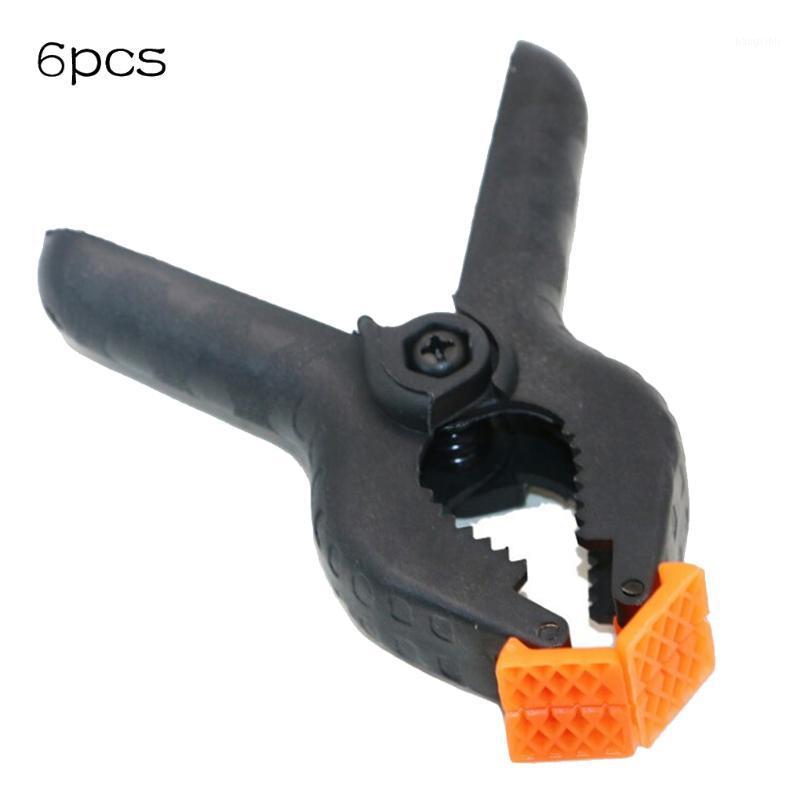 

6pcs Background Studio Photography Stand Holder Clips Backdrop Pegs Photo Shooting Equipment1