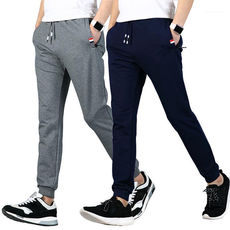 

2020 New Men Jogger Pants Slim Fit Male Trousers Casual Sweatpants Sports Streetwear Mens GYMS Fitness Workout Sweatpants 5XL1, Jc860blue