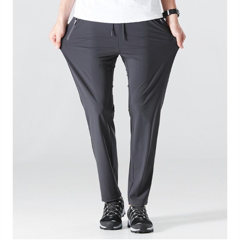 

Summer Air Conditioning Pants Men's Outdoor Travel Labor Draping Ice Silk Elastic Mesh Quick Drying Casual Trousers, Black 001 straight