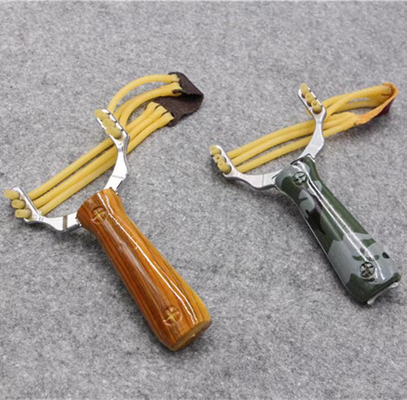 

2021 new camouflage wild wolf outdoor catapult three card latex tube rubber band bow zinc alloy wood grain shooting fishing card ball catapu