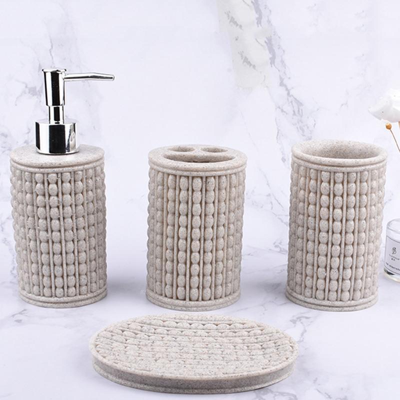 

Modern creative resin sandstone hand-polished four-piece bathroom accessories lotion bottle& soap dish & toothbrush holder & cup1