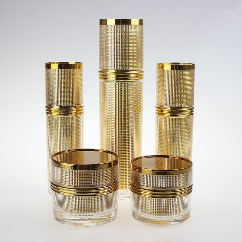 

100ml Spray Bottle Plastic Empty,Gold Container with Lotion Pump1