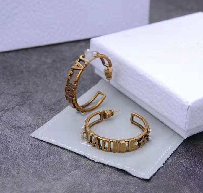 

Wholesale-earrings are a hit in Europe and the U.S. luxury custom brass monochrome classic earrings