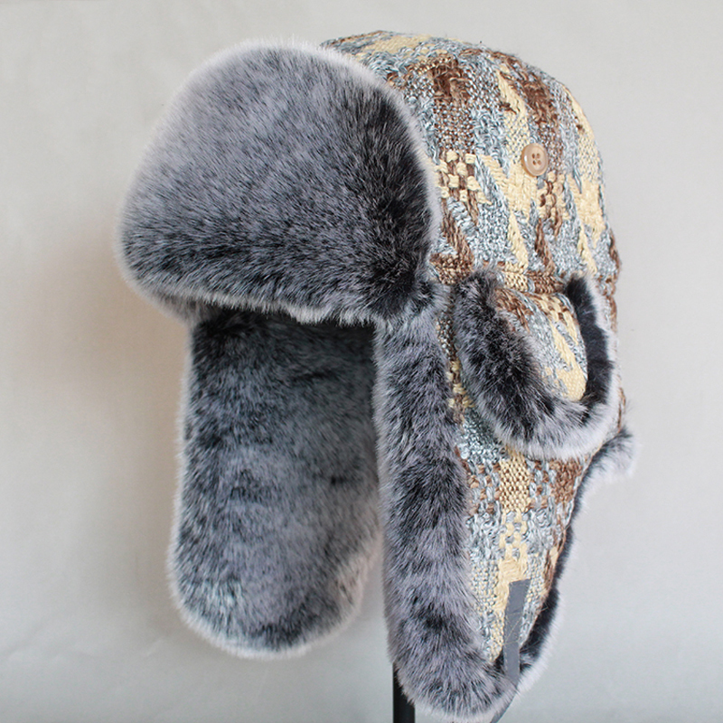 

Winter ushanka snow cap from skin of the fake man-made trapper hat