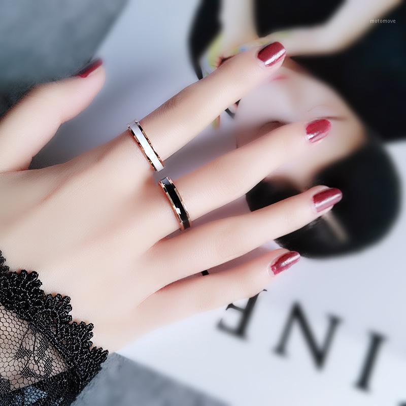 

Titanium steel rose gold fashion black and white Oiupainting ring hot selling ring jewelry1