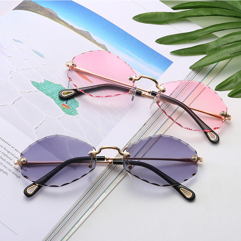 Wholesale-rétro lunettes de soleil ovale femmes lunettes sans cadre Vintage soleil verre lunettes lunettes UV400