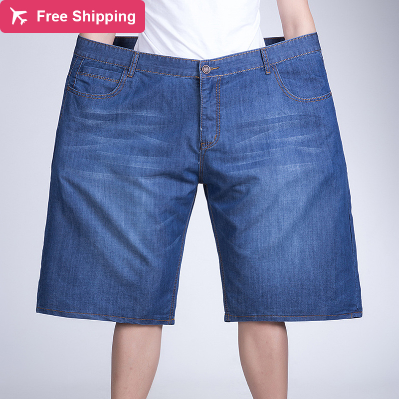 

More size new elastic waistline thin classic style down stretch pants men's jeans, Dark blue