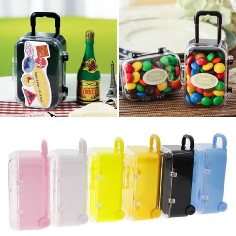 

2020 1Pcs New style Creative Mini Hand-held Rolling Pull Lever Travel Suitcase Wedding Candy Storage Box Christmas Candy Boxes1