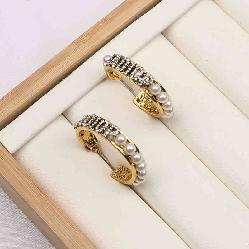 

Factory Wholesale new round pearl diamond earrings women's fashion personalized simple Earrings