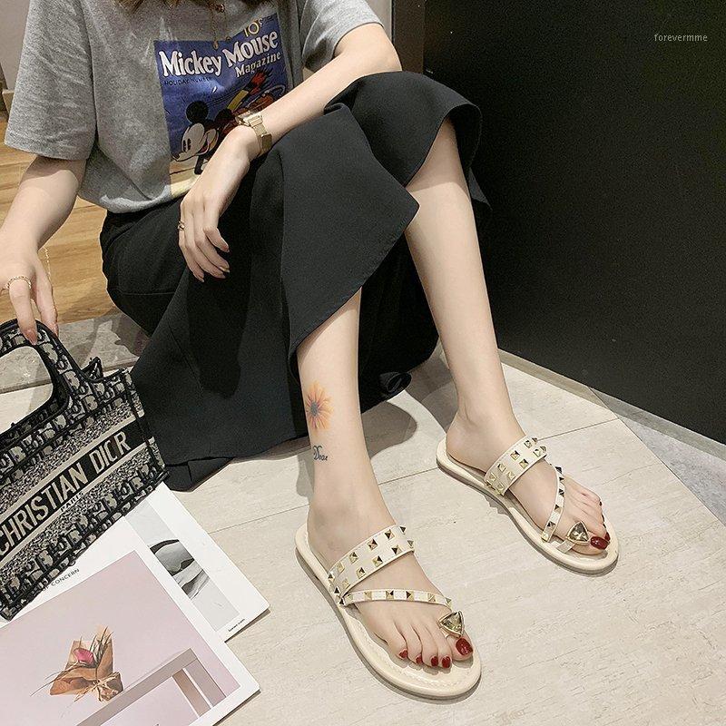 

Summer 2020 new soft bottom rivet sandals fashion wild flat bottom rhinestone sleeve toe wear sandals and slippers Z8531, Beige