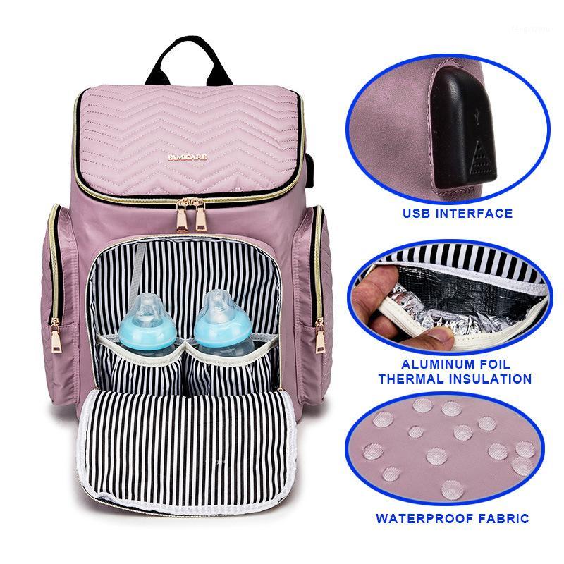 

Fashion Diaper Backpack Large Capacity Nappy Bag Waterproof Maternity Travel Nursing Bags Baby Care Stroller Handbags USB design1, Changing pad