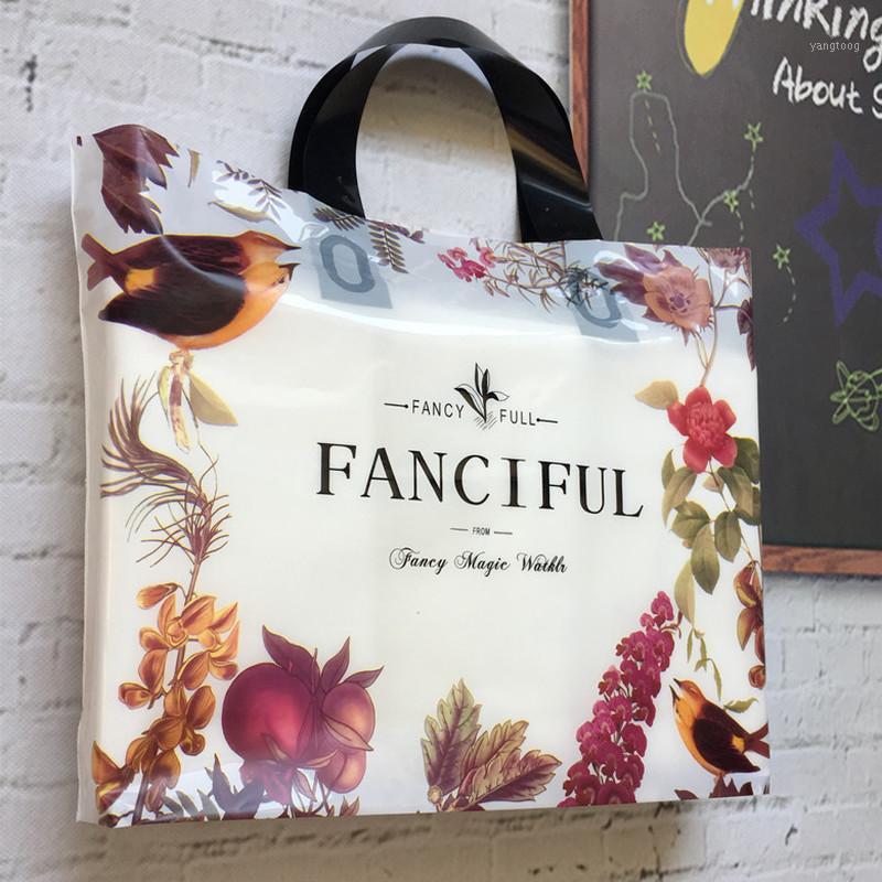 

50pc /lot Plant printing Plastic Gift Bags Thick Portable Storage Shopping Bags Clothing store Wedding Party supplies1
