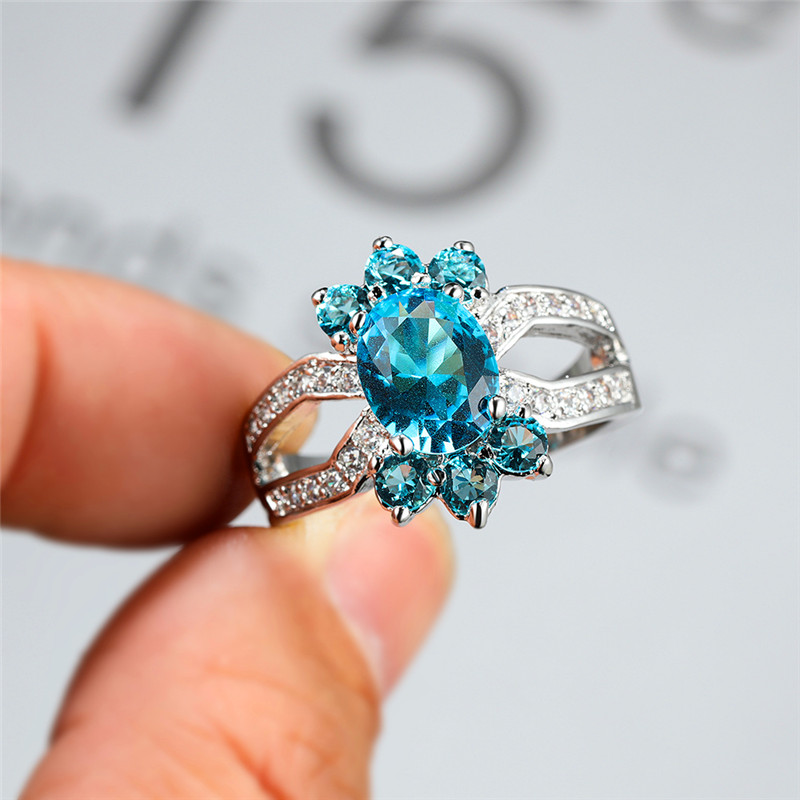 

Luxury Female Aqua Blue Crystal Ring Fashion Classic Silver Color Wedding Rings For Women Cute Oval Hollow Big Engagement Ring