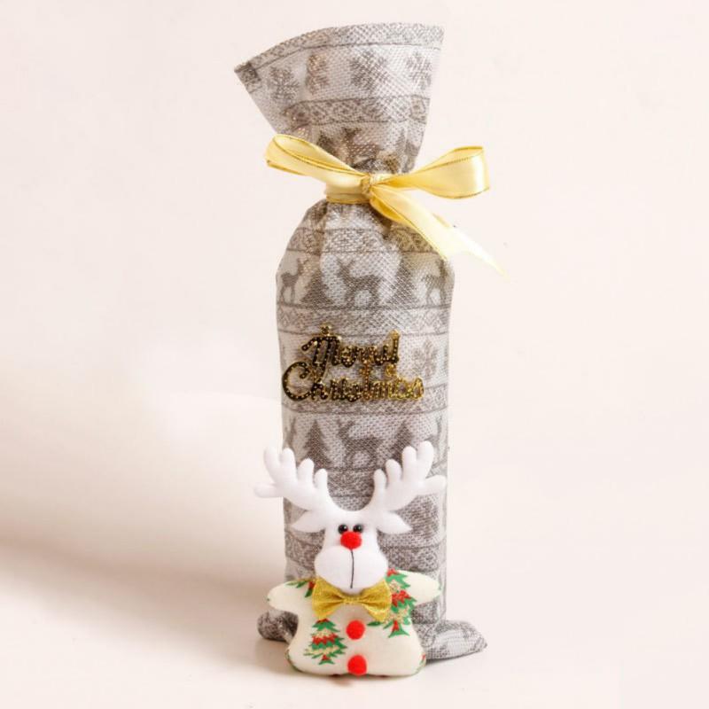 

Cute Santa Claus Snowman Pattern Red Wine Bottle Set with Golden Ribbon Christmas Decorations for Home1
