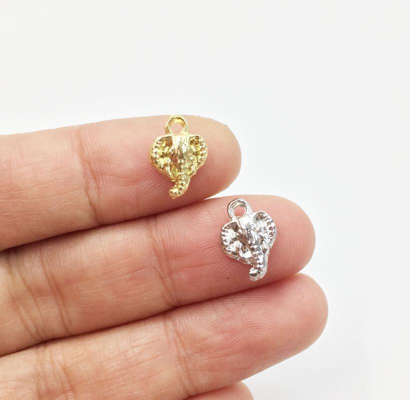 

Eruifa 20pcs 10*8mm Mini Elephant Head Charms Pendant necklace,earring jewelry DIY handmade Gold Lead/Nickle Free1