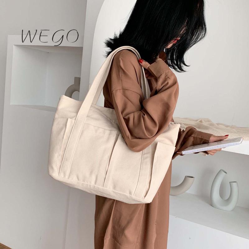 

Large-capacity solid color Japanese canvas bag female shoulder bag student simple portable canvas wild female, Black
