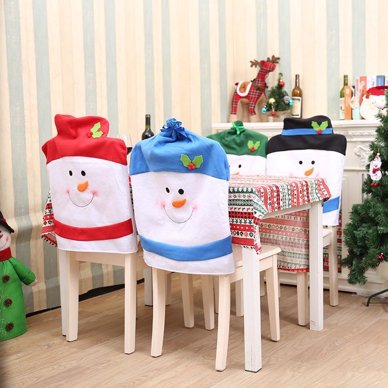 

Christmas Chairs Cover Santa Claus Cap Non-woven Dinner Table Back Covers Living Room Dining Room Star Hotel and Chair Decor1