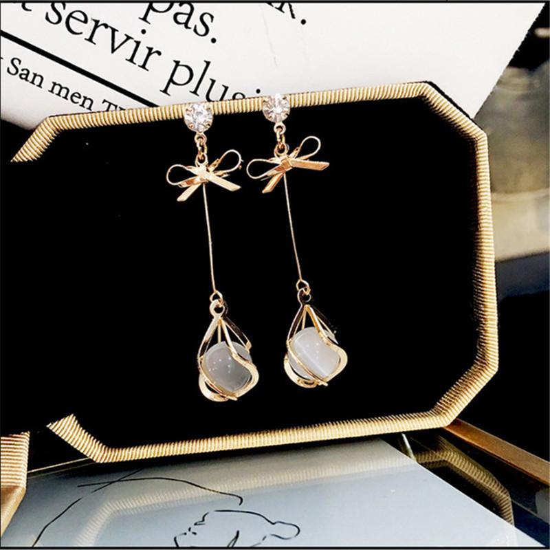 

Opal Female Butterfly Combined with gold Earrings Simple Personality Wild Temperament Tassel Woman Earrings Give Gifts to Women