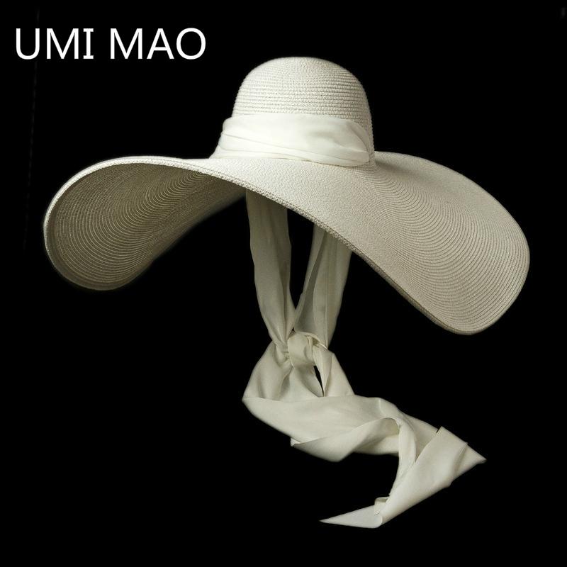 

Berets UMI MAO Spring Summer Style Straw With Strappy Large Eaves Concave Shape Outdoor Beach Travel Sunscreen Hat, White