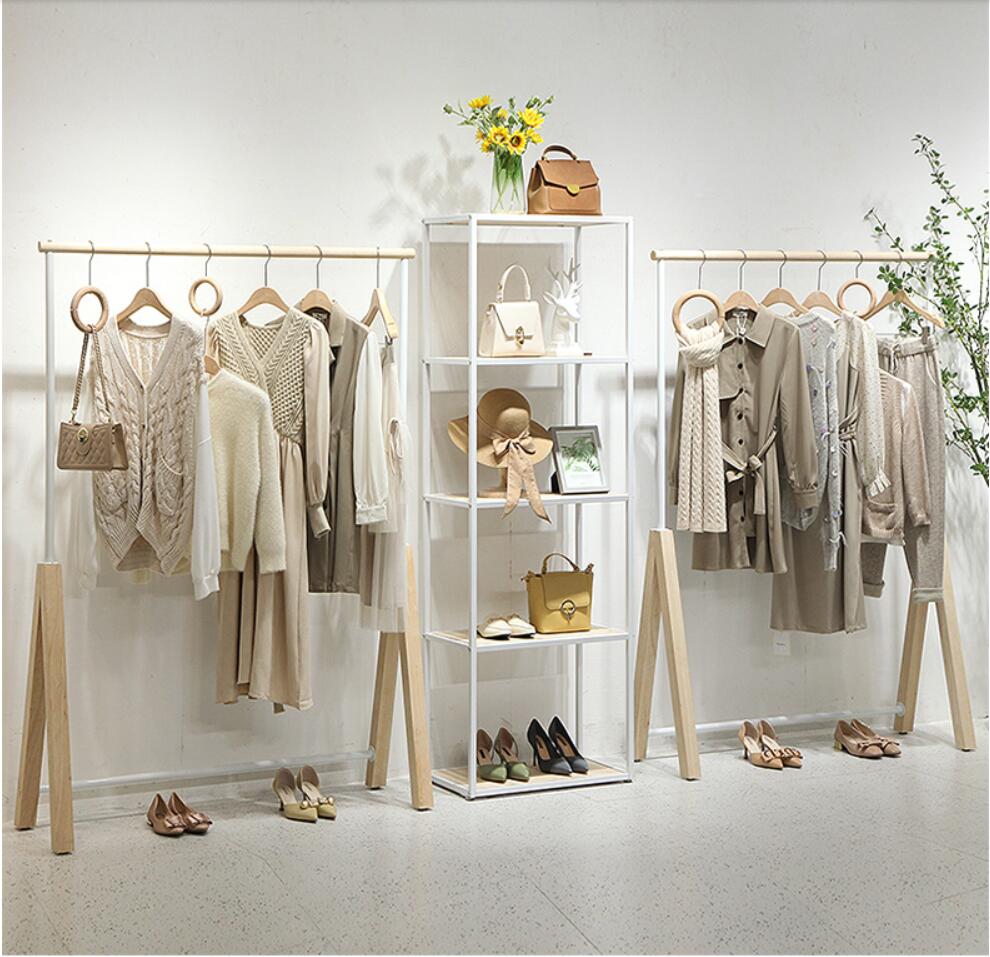 

Clothing store display rack Commercial Furniture women cloth shop hanging Organization shoe bag racks landing against the wall clothes Storage Holders white