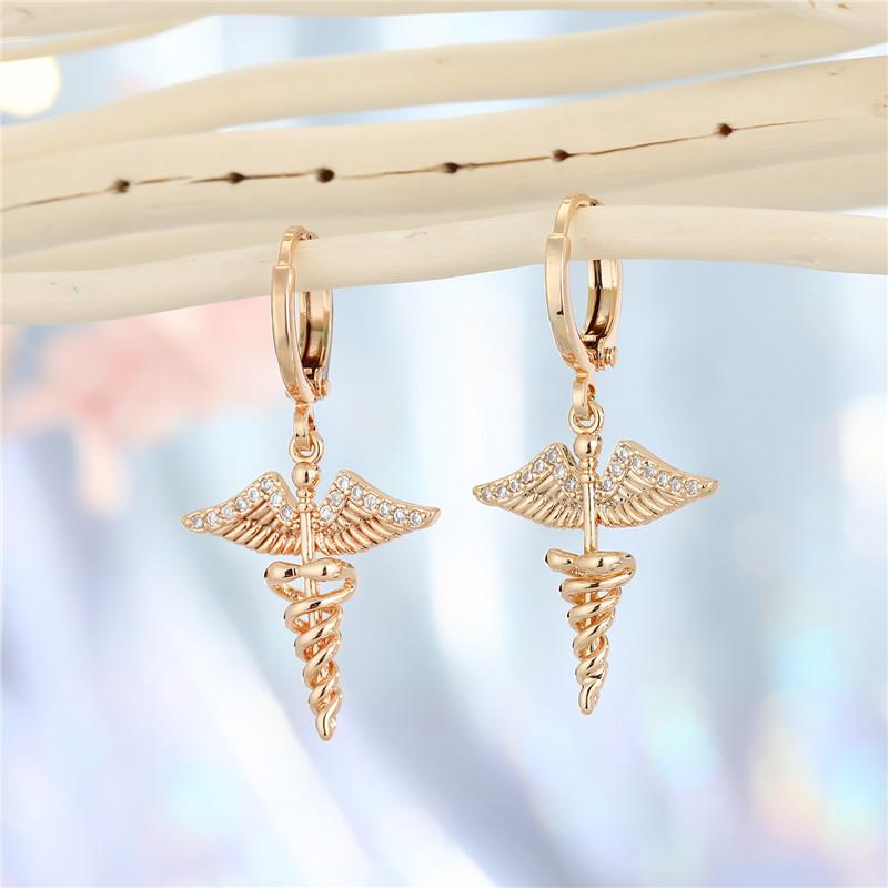 

Hoop & Huggie 1Pair Gothic Shiny Rhinstone Wing Scepter Earrings For Women Vintage Punk Crystal Cupid Angel Small Ear Stud Jewelry E698
