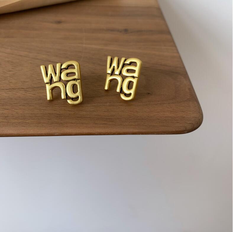 

2021 hot sale Korea old retro copper color letter earrings personality European and American earrings S925 silver needle earrings, Golden;silver