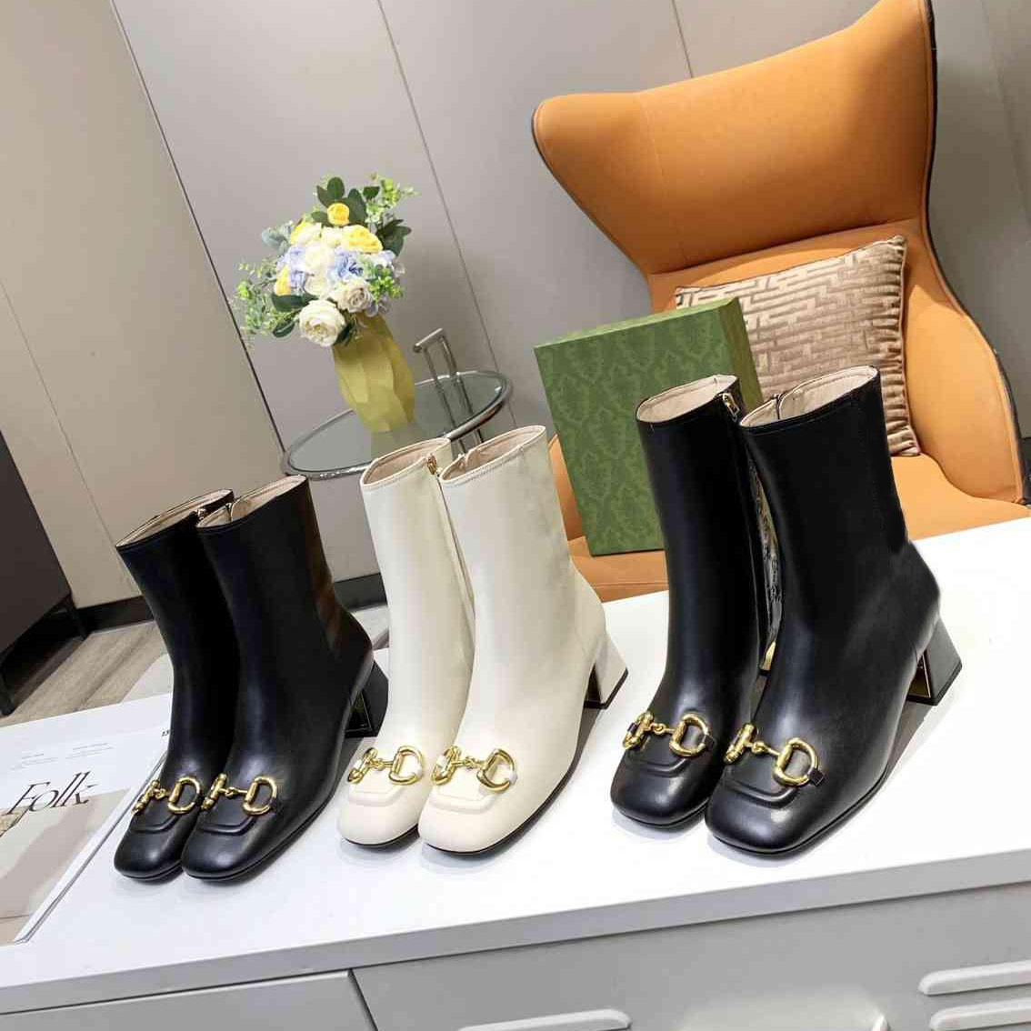 

Women saddle buckle middle Heel Ankle Boots Betty Candy Colored Fashion Autumn Winter Pine Cake Bottom Boot with All Cowhide Finish and TPU Outsole