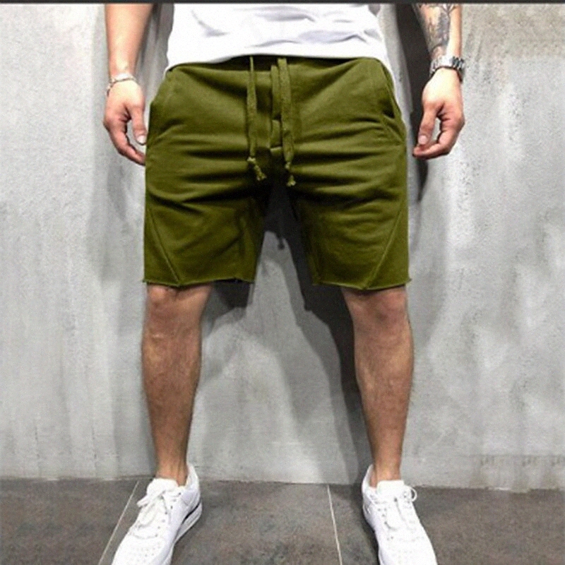 Sports décontractés / sportifs pour hommes Pantalon de survêtement de cordon de cuillé pantalon courte pantalon décontracté quotidien Micro-élast