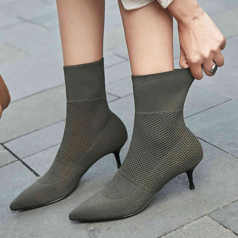 

boots ankle boots with black high heels, knitted or crocheted, female stretch autumn, brand design, pointed finger at the elegant foot, dj7d