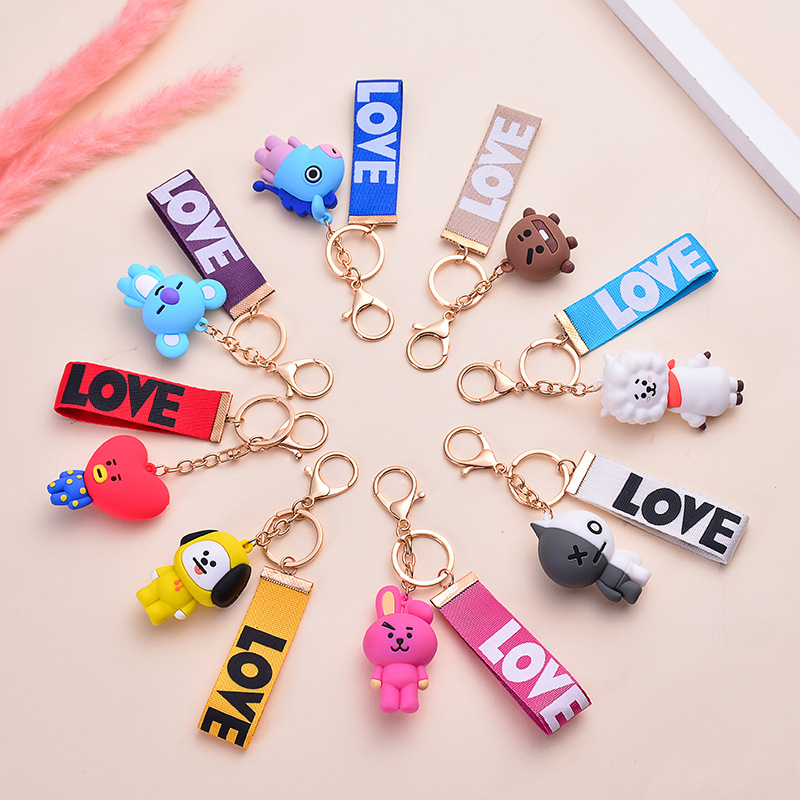 

Korean version of BTS doll key chain male and female cartoon soft rubber ribbon bag Keychain chains pendant