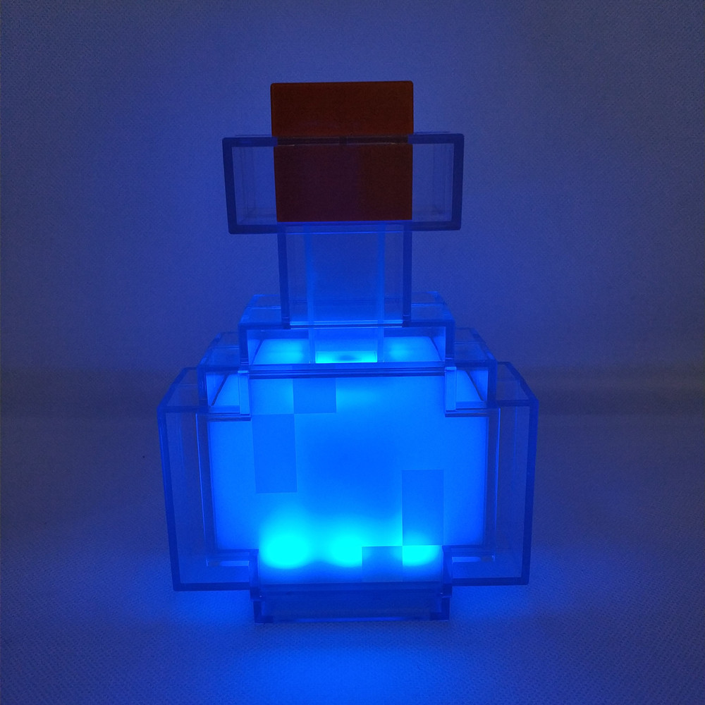 

Color Changing Potion Bottle Lights Up and Switches Between 8 Different Colors Shake Control Night Lamp Toy C0305