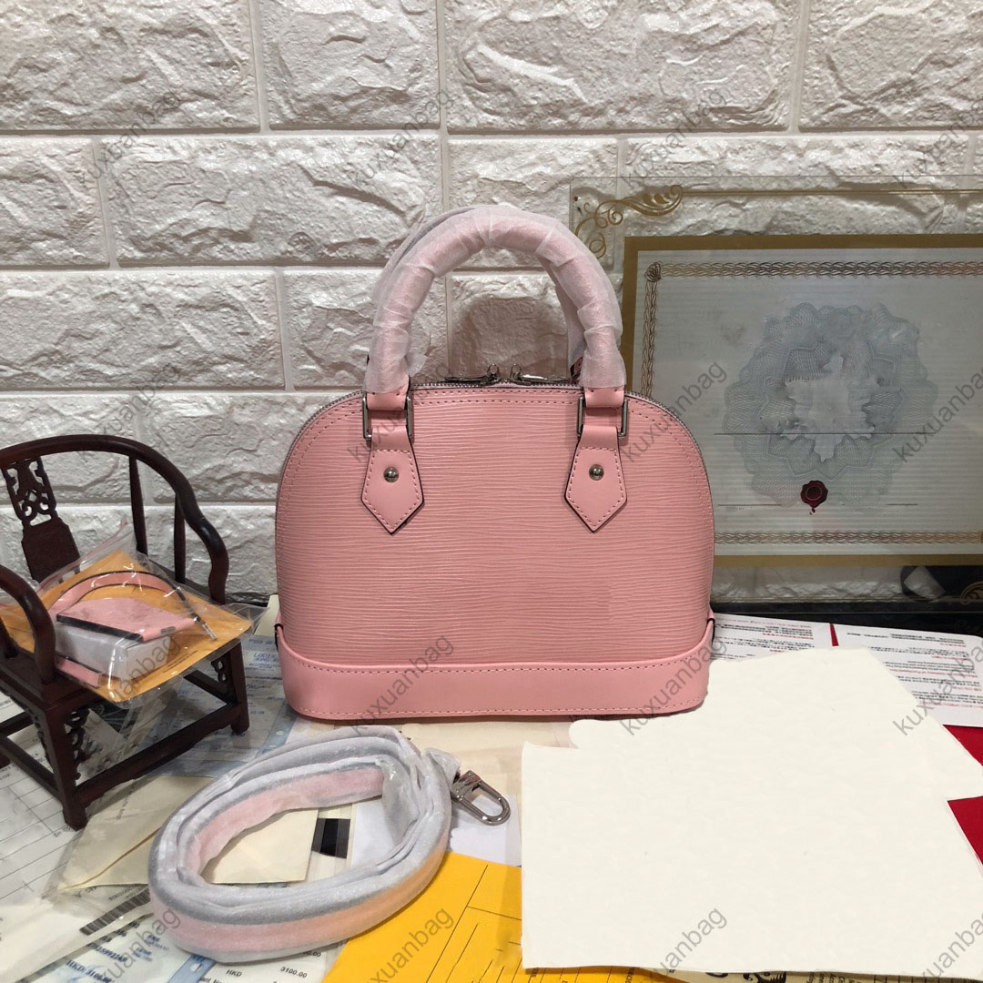 

Women Luxurys Designers Bags 2021 Top quality leather trim double zipper open and close with a detachable shoulder strap for lightweight cross-slung., Red