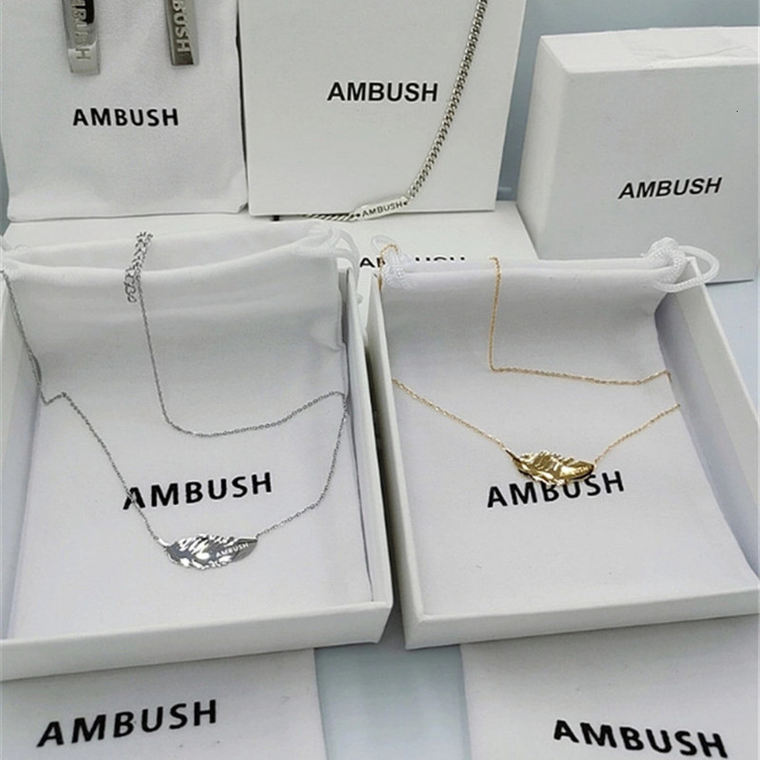 

2021 New Titanium Alloy Solid Ambush Feather Pendant Necklace Men Women Accessories Efuf