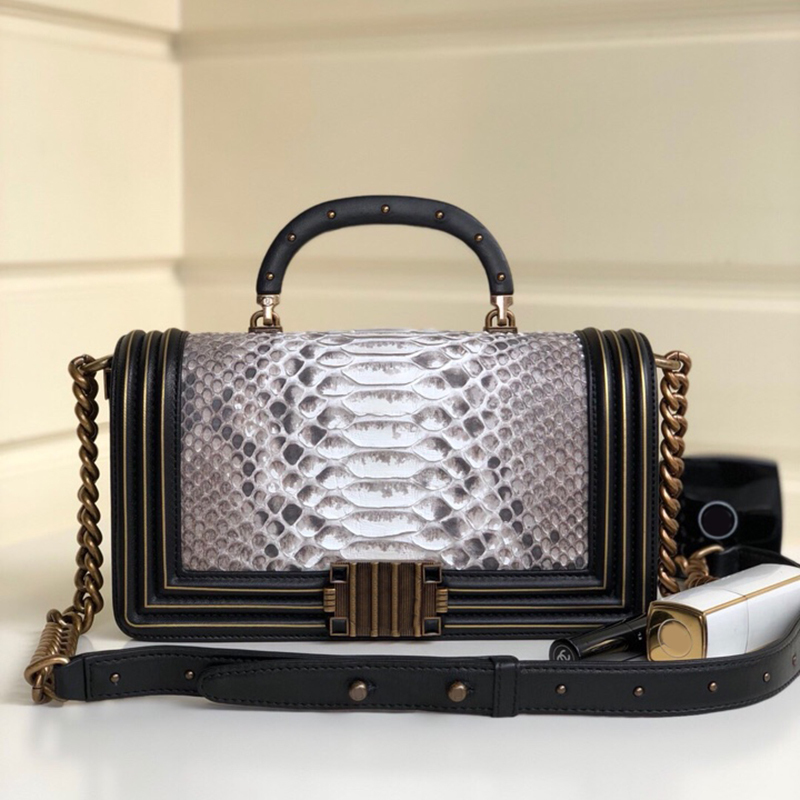 

Brand new style shoulder bag 918820 snakeskin hand child rivet handle precious resin metal buckle full of retro flavor unique style fashion