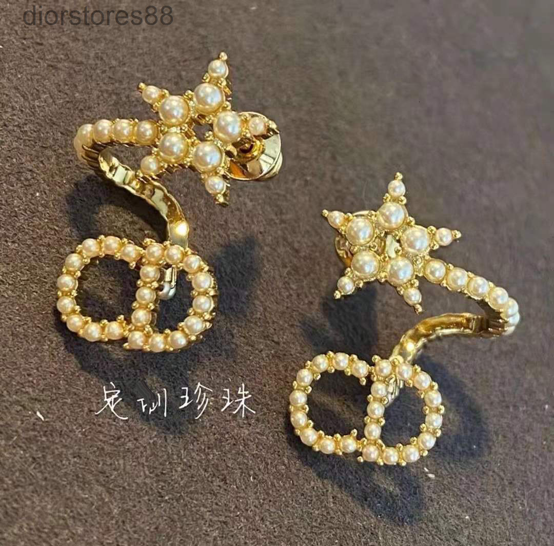 

ring dijia / dejia 2021 fashion trend cd letter pearl star ear clip 925 silver needle female jewelry earrings