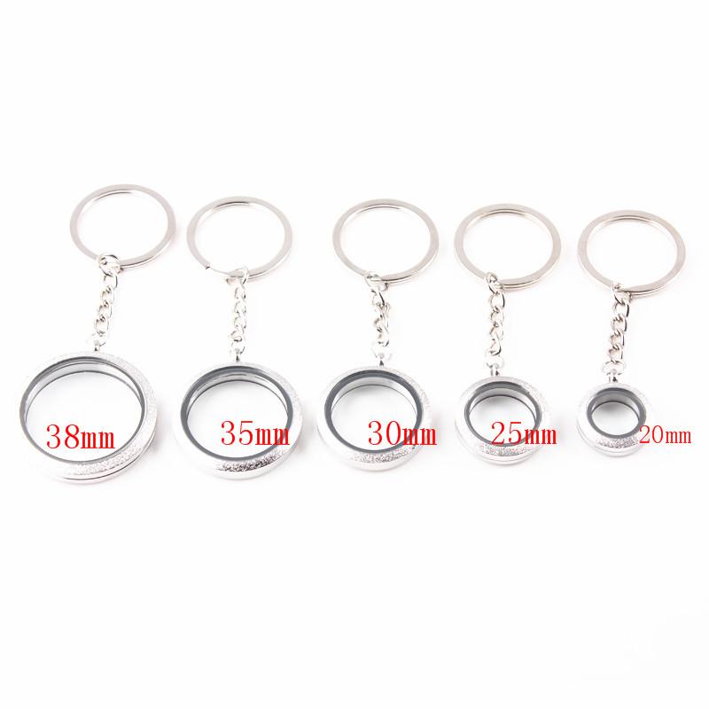 

Keychains 5pcs/lot 38mm 35mm 30mm 25mm 20mm Silver Sparkle Living Glass Floating Locket Pendant Key Ring