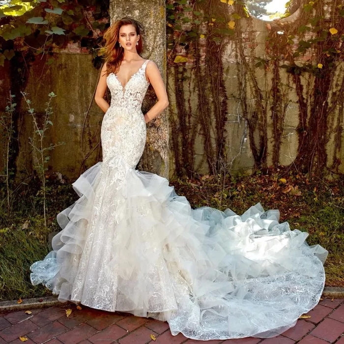 

Luxury White Lace Applique Bridal gown Aso Ebi princess beaded church Layers Ruffles Chapel Train Long Sleeves Lace-up Arabic Wedding Dresses