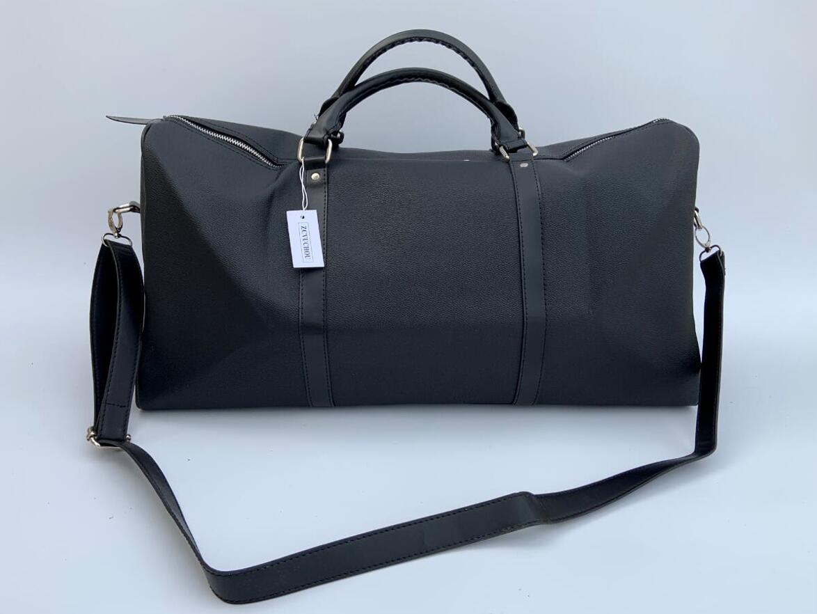 

54CM large capacity women travel bags 2022 sale quality men shoulder duffel bags on luggage bottom rivets with lock head