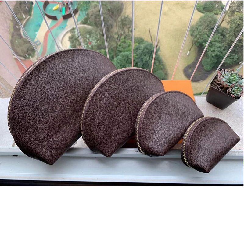 

2021 Women cosmetic bags organizer famous makeup 4pcs 4 in 1 bag travel pouch make up bag cluch purses organizador toiletry bag
