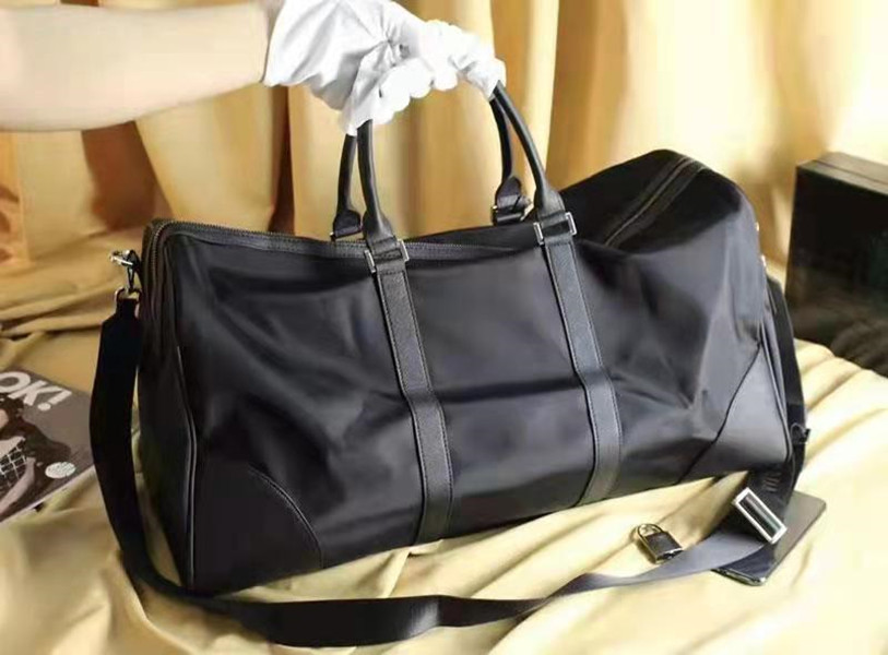 

Designers Duffel Bags 45CM 50CM 55CM luxury large capacity travel sale High quality women men Genuine Leather shoulder Fashion bag carry rivets with lock head----5AAAA, Black