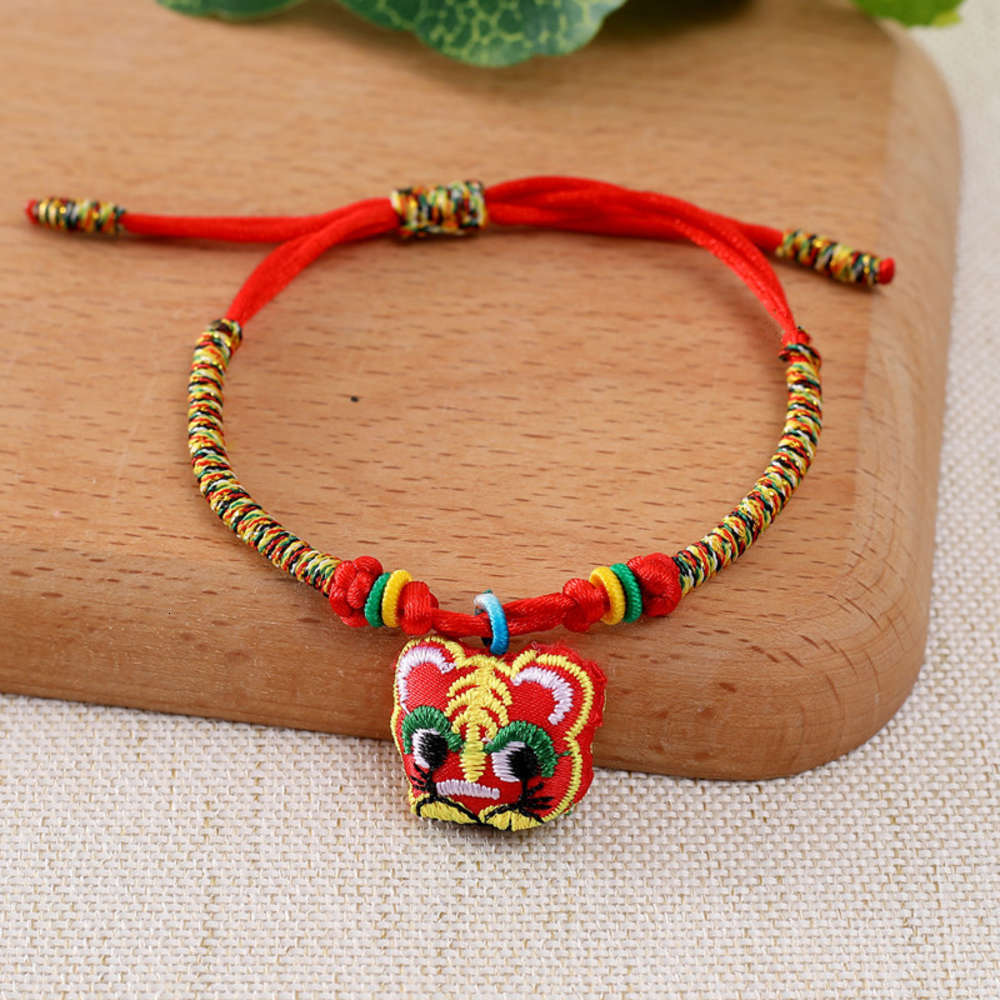 

Children's Dragon Boat Festival colorful rope tiger head Bracelet hand woven wormwood sachet gift, Golden;silver