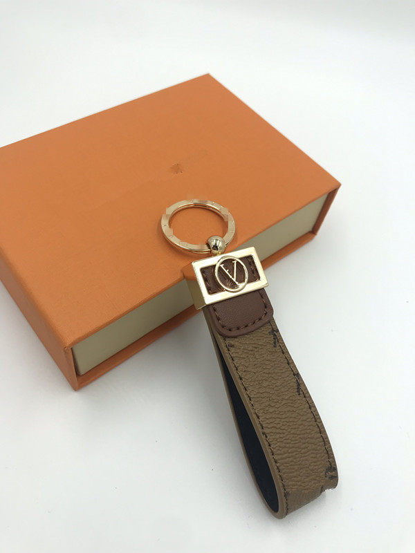 

Luxury keychain designer unisex key chain real leather with stainless steel keychain keyring in Golden with brown with box LV29