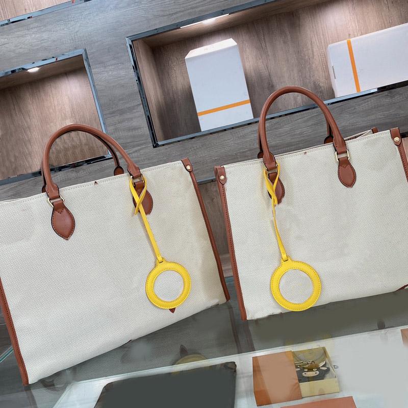 

Designer Beach Bag Leather Patchwork Canvases ONTHE Embroidered Print Texture Luxurious Beaches Beat All Previous Color Oversized capacity Toth Shopping Bags, No box