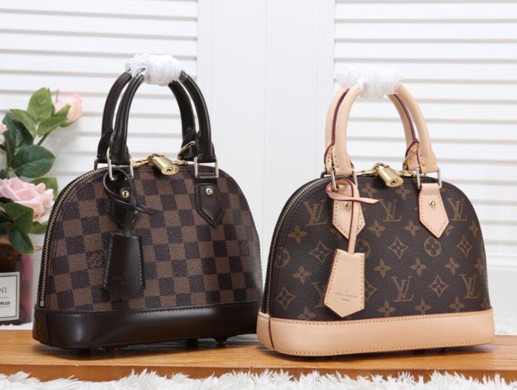 

newLVLOUISVITTON VUTTONWomen's Bags European and American fashion designer shell bag PU leather gold chain / a large