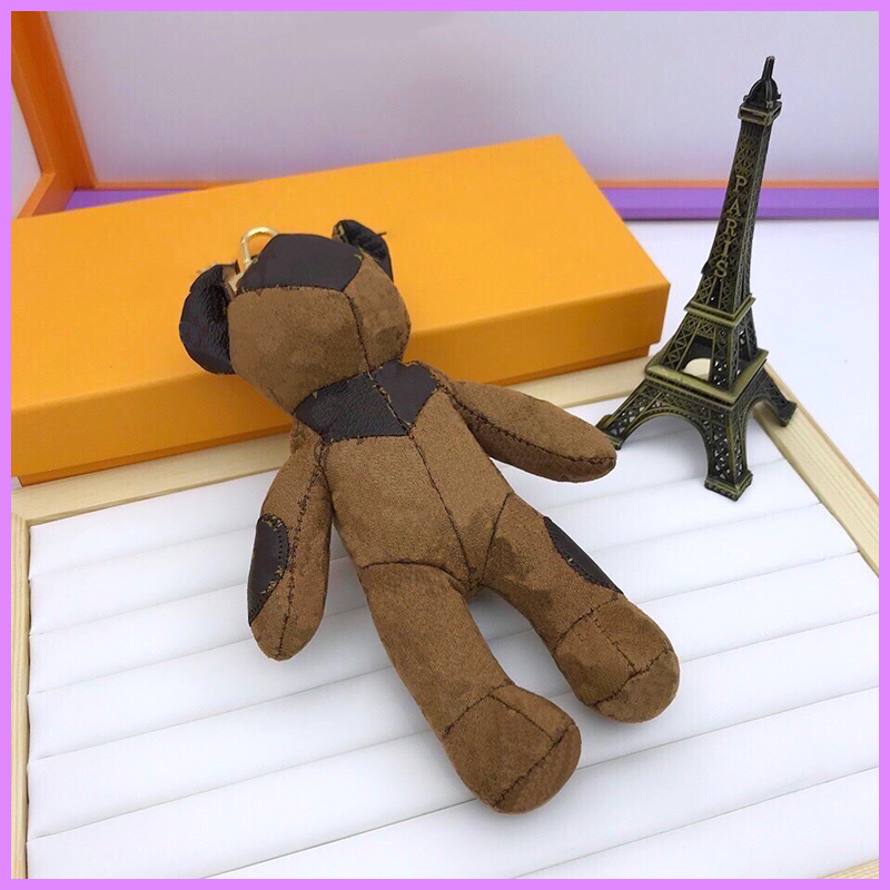 

Keychain Women Mens Designer Keychains Animal Key Charm Lovers Puppet Bear Luxurys Designers Car Wallet Bag Cartoon KeychainsD218063F