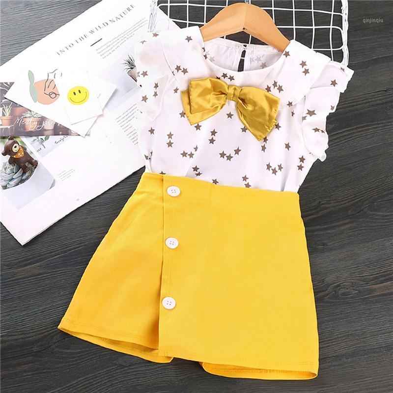 

Girl's 2Pcs Summer Clothes Suit Sleeveless Stars Printed Doll Collar Bowknot Shirts Tops With Solid Color A-line Short Skirt Clothing Sets, White